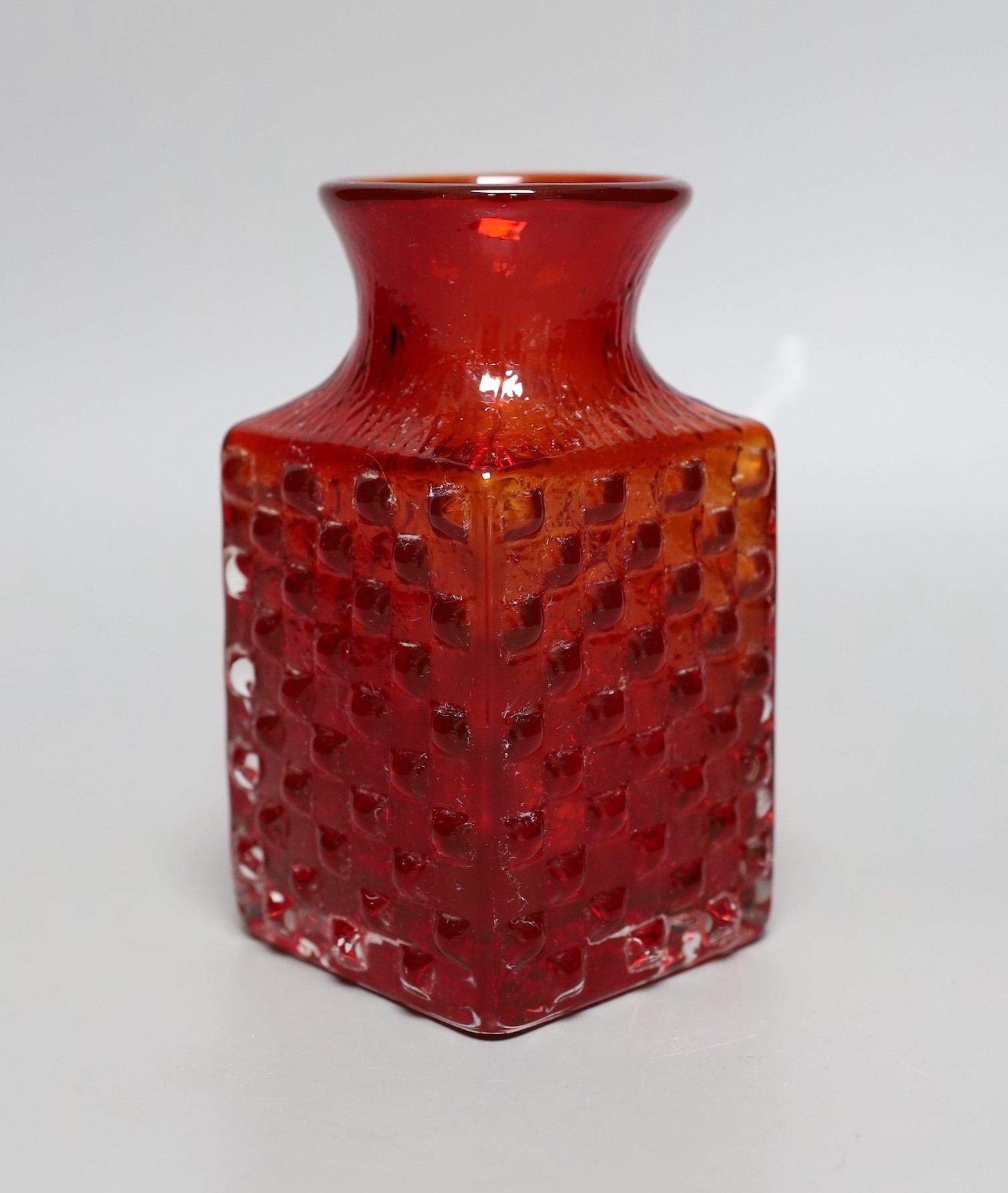 A Whitefriars 'Chess' glass vase, designed by Geoffrey Baxter, pattern number 9817, red glass, 14.5cm tall